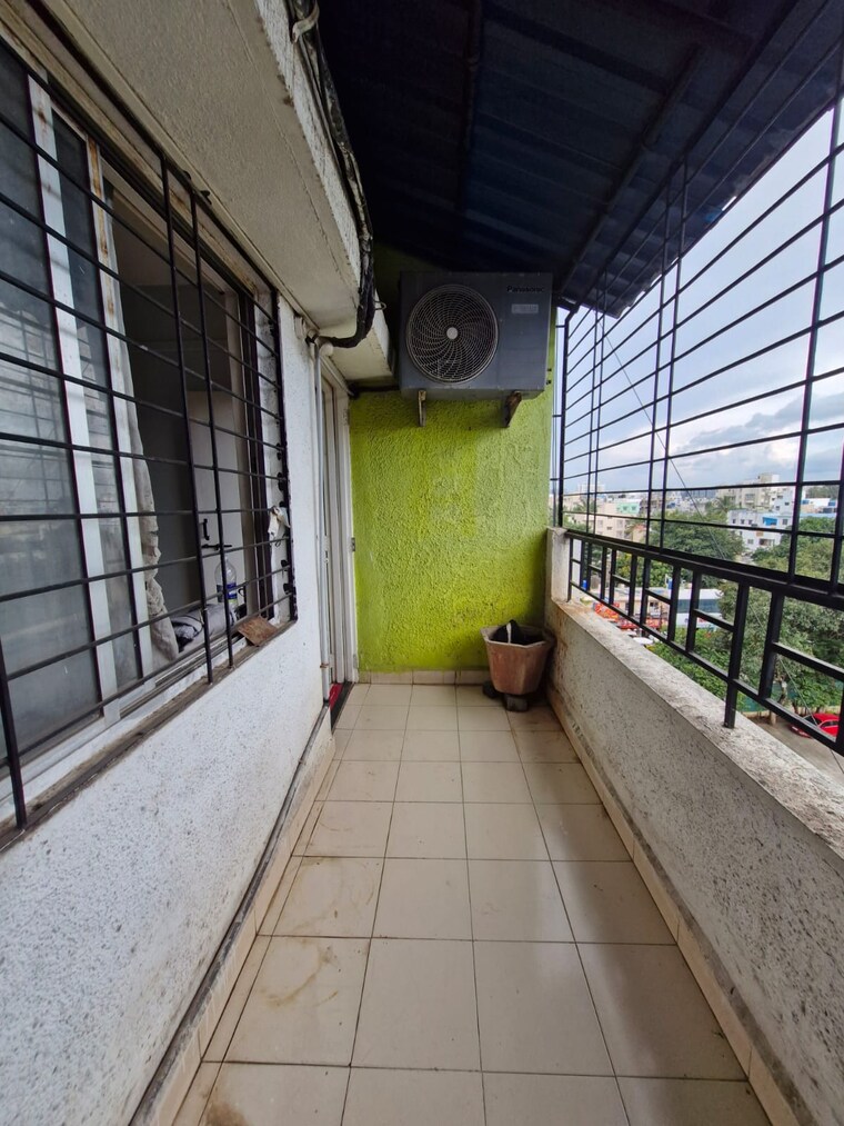 Balcony, karan-ashiyana 2 Bedroom 813 Sq.Ft. Apartment In Wadgaon Sheri Pune 9341296