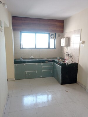 Kitchen in 2 BHK Apartment at Radhika Park, Wadgaon Sheri – for Rent