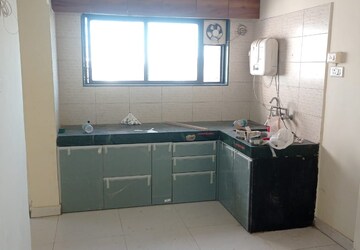 Kitchen in 2 BHK Apartment at Radhika Park, Wadgaon Sheri – for Rent