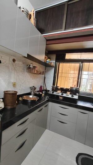 Kitchen in 2 BHK Apartment at Adityaraj Sai Prasad, Vikhroli East – for Rent