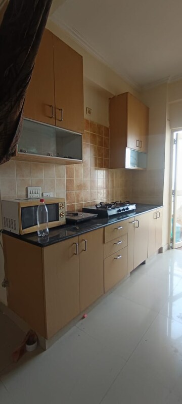 Kitchen in 2 BHK Apartment at Gardenia Golf City, Sector 75 – for Rent