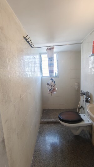 Bathroom in 2 BHK Apartment at Juhu Chandan CHS, Vile Parle West – for Rent