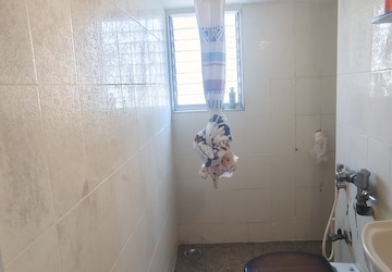 Bathroom in 2 BHK Apartment at Juhu Chandan CHS, Vile Parle West – for Rent