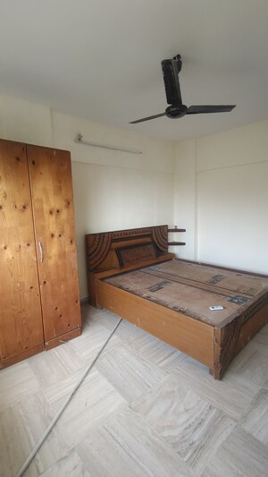 Bedroom in 2 BHK Apartment at Juhu Chandan CHS, Vile Parle West – for Rent