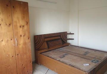 Bedroom in 2 BHK Apartment at Juhu Chandan CHS, Vile Parle West – for Rent