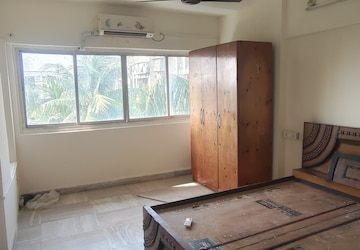 Bedroom in 2 BHK Apartment at Juhu Chandan CHS, Vile Parle West – for Rent