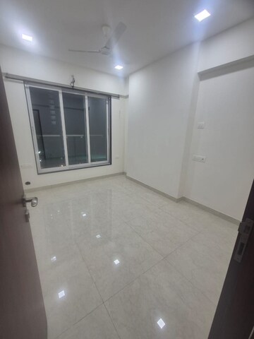 Room in 2 BHK Apartment at Triumph Swastik, Malad West – for Rent