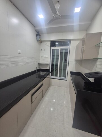 Kitchen in 2 BHK Apartment at Triumph Swastik, Malad West – for Rent