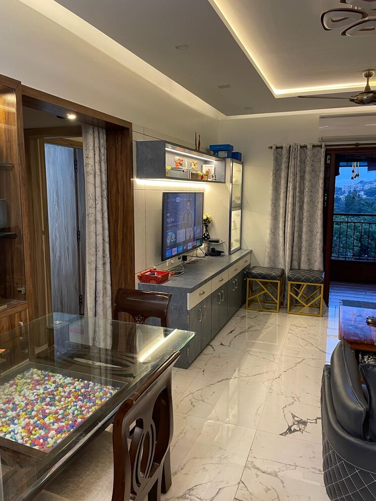 Living Room, pinnacle-kalpataru 2 Bedroom 950 Sq.Ft. Apartment In Erandwane Pune 9341607