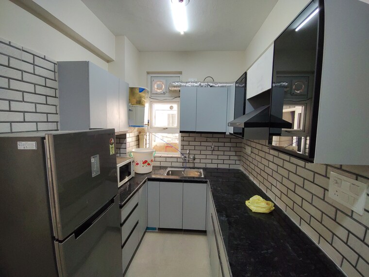 Kitchen, divine-meadows 2.5 Bedroom 1227 Sq.Ft. Apartment In Sector 108 Noida 9341689