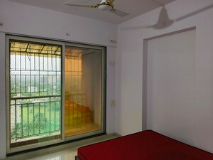 Room in 2 BHK Apartment at Kalyan West – for Rent