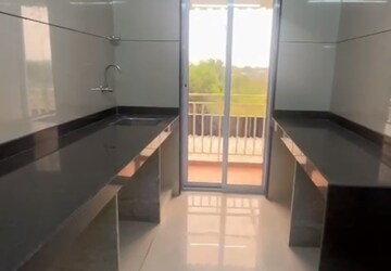 Kitchen in 1 BHK Apartment at Ritu Gardenia, Naigaon East – for Sale