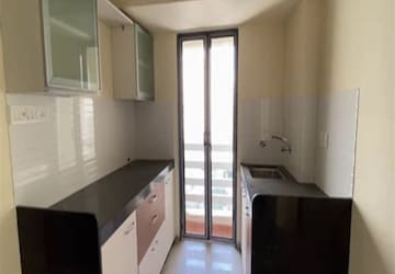 Kitchen in 2 BHK Apartment at Ekta Parks Ville, Virar West – for Rent