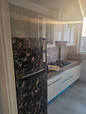 Kitchen in 2.5 BHK Apartment at DLF New Town Heights Town Houses, Sector 86 – for Rent