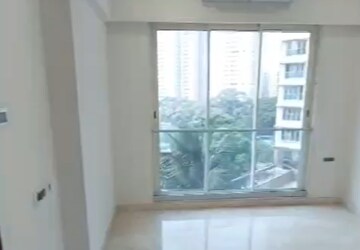 Room in 2 BHK Apartment at Ekta Tripolis, Goregaon West – for Sale