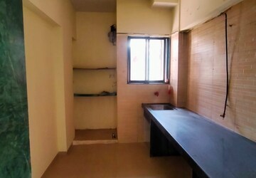 Kitchen in 2 BHK Apartment at Shree Siddhivinayak, Owale – for Rent