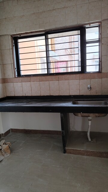 Kitchen in 2 BHK Apartment at Magarpatta Jasminium, Hadapsar – for Sale