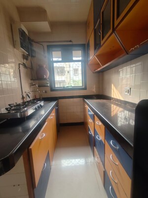 Kitchen in 1 BHK Apartment at Rishikesh CHS, Malad West – for Rent