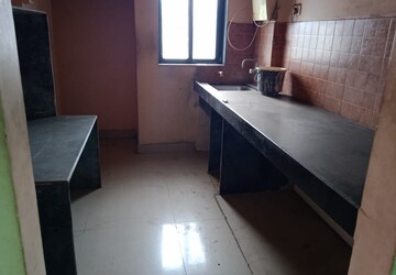 Kitchen in 2 BHK Apartment at Kavya Hill View CHS, Anand Nagar – for Rent