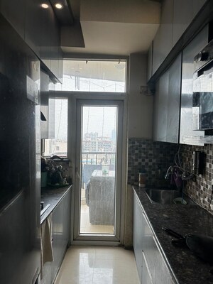 Kitchen in 2.5 BHK Apartment at Amrapali Zodiac, Sector 120 – for Sale