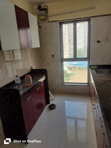Kitchen in 1 BHK Apartment at Dharti Pressidio, Kandivali West – for Rent