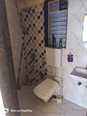 Bathroom in 1 BHK Apartment at Dharti Pressidio, Kandivali West – for Rent