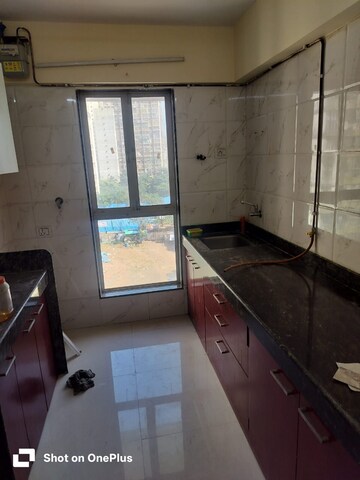 Kitchen in 1 BHK Apartment at Dharti Pressidio, Kandivali West – for Rent