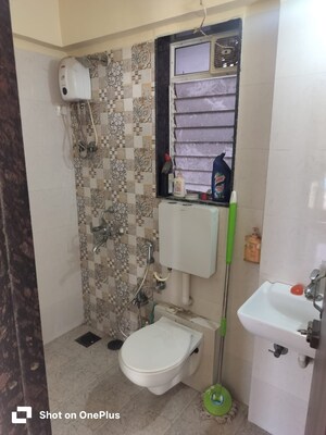 Bathroom in 1 BHK Apartment at Dharti Pressidio, Kandivali West – for Rent