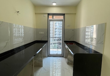 Kitchen in 2 BHK Apartment at JK Iris, Mira Road – for Rent