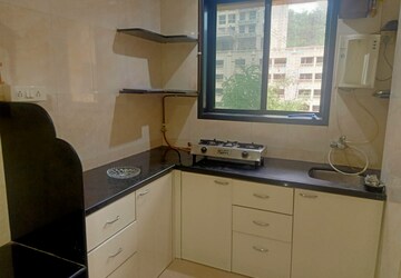 Kitchen in 1 BHK Apartment at Hiranandani Gardens Kingston, Powai – for Rent