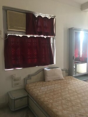 Living Room in 1 BHK Apartment at Poornima Apartments, Colaba – for Rent