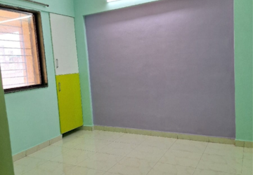 Room in 2 BHK Apartment at Swatnapurti Housing Society, Kharadi Bypass Road – for Rent