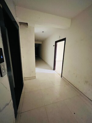 Building Lobby in 1 BHK Apartment at VVIP Nest, Raj Nagar Extension – for Sale