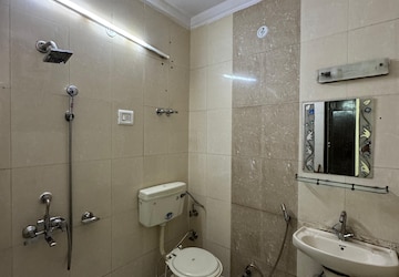 Bathroom in 2.5 BHK Apartment at Gaur Green City, Indrapuram – for Rent