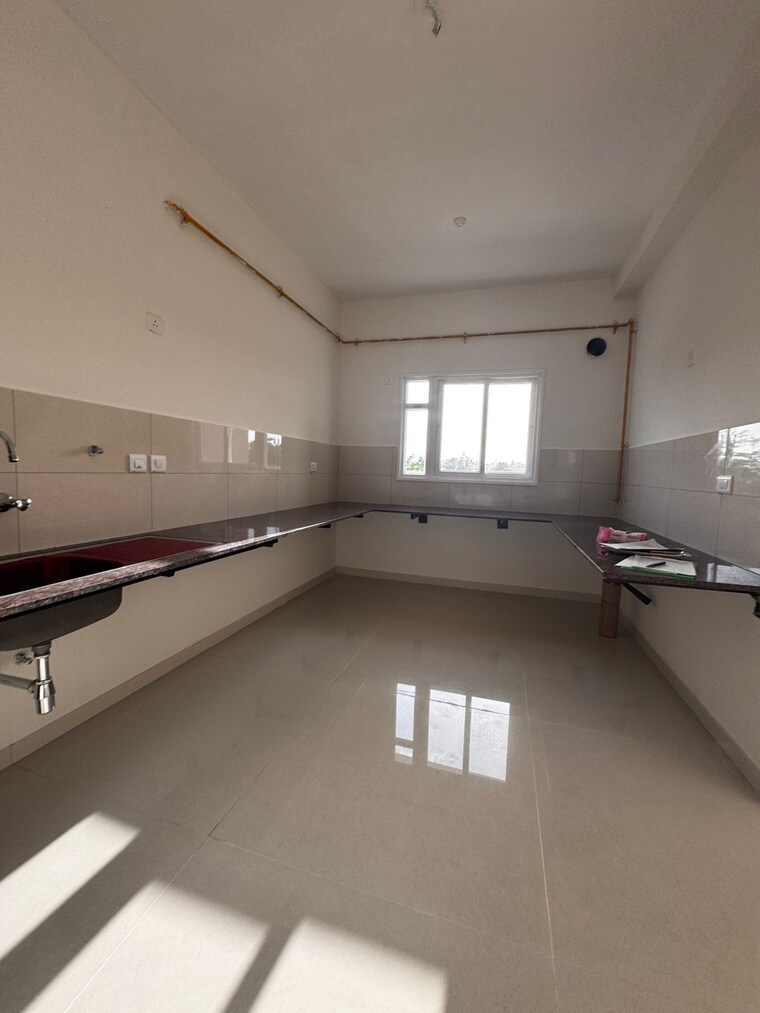 Kitchen, l-t-raintree-boulevard-phase-2 4 Bedroom 2765 Sq.Ft. Apartment In Hebbal Bangalore 9342519