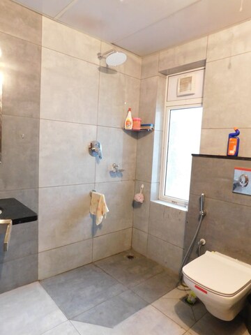 Bathroom in 3 BHK Apartment at Aparna Sarovar Zenith, Nallagandla – for Rent