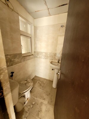 Bathroom in 3 BHK Apartment at Amrapali Platinum, Sector 119 – for Sale