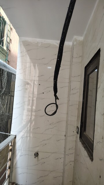 Bathroom in 2 BHK Builder Floor at Dwarka Mor – for Rent