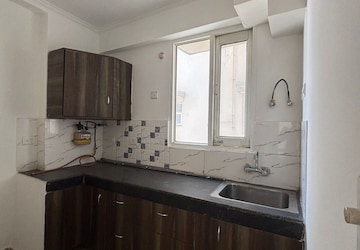 Kitchen in 2 BHK Apartment at Omkar Royal Nest, Tech Zone 4 Greater Noida – for Sale