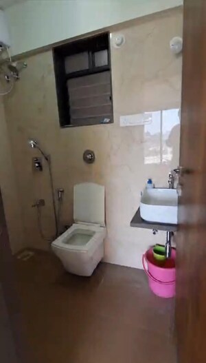 Bathroom in 2 BHK Apartment at Chaitanya Anand Lunkhod CHSL, Andheri West – for Rent