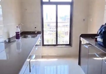 Kitchen in 2 BHK Apartment at Chaitanya Anand Lunkhod CHSL, Andheri West – for Rent