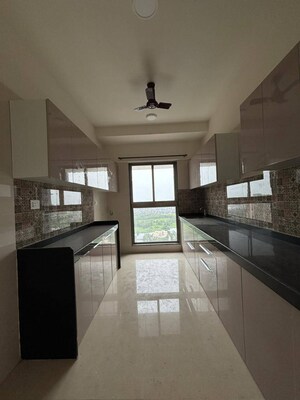 Kitchen in 2 BHK Apartment at Raj Infinia, Malad West – for Rent