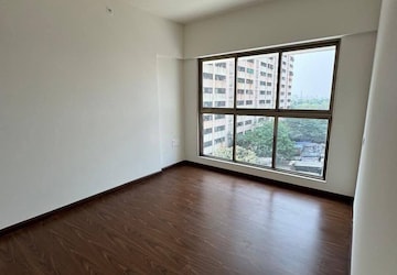 Room in 2 BHK Apartment at Raj Infinia, Malad West – for Rent