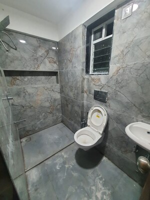 Bathroom in 1 BHK Apartment at Bindra Complex, Andheri East – for Rent