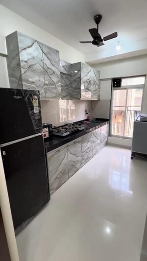 Kitchen in 2 BHK Apartment at Bini Winspace Amelio, Andheri West – for Rent