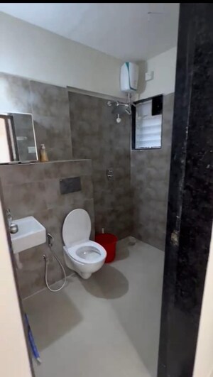 Bathroom in 2 BHK Apartment at Bini Winspace Amelio, Andheri West – for Rent