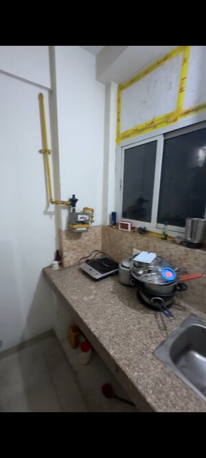 Living Room in 1 BHK Apartment at Wave City, Wave City – for Sale