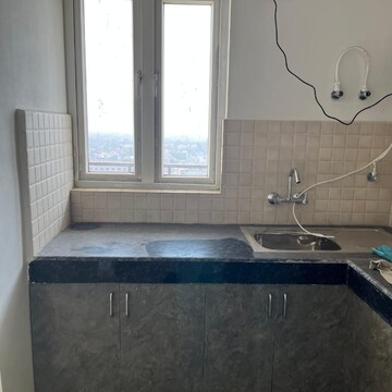 Kitchen in 2 BHK Apartment at Adore Happy Homes Exclusive, Neharpar Phase 2 – for Sale