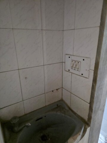 Bathroom in 2 BHK Apartment at Nandavan CHS, Vile Parle East – for Rent