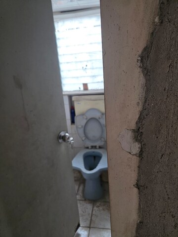 Bathroom in 2 BHK Apartment at Nandavan CHS, Vile Parle East – for Rent